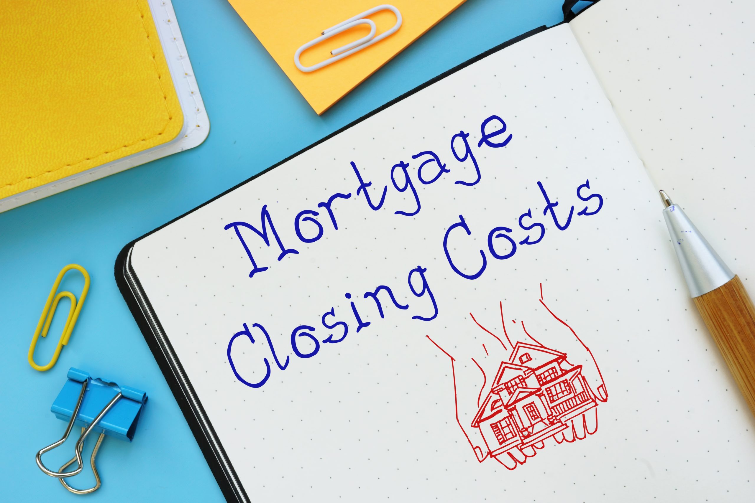 Business concept meaning Mortgage Closing Costs with phrase on the piece of paper.